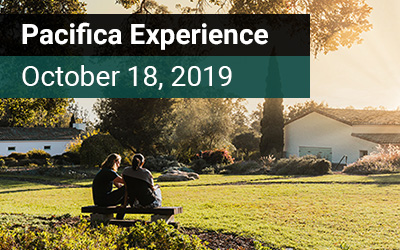 October Open House - View of the Lambert Campus Lawn with students sitting